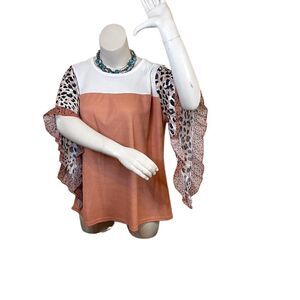 Color block top with butterfly flirty sleeves. NWT